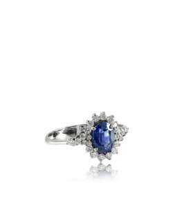 Sapphire and White Diamond surround ring set in 18kt White Gold